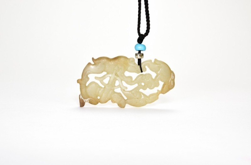 Qing - A White Jade Carved &lsquo;Hunter&rsquo; Pendant