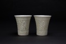 A Pair Of Gray Green Glazed Molded&rsquo;Arhat And Shou&rsquo; Cups,
