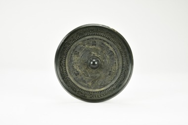 Chinese Bronze Mirror with Deities and Beasts.