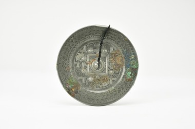 A Bronze TLV Mirror with Four Divine Beasts. Han Dynasty (206 BC &ndash; AD 220).