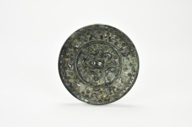 A Bronze Mirror with Ocean Beasts and Grape PatternChina, Tang Dynasty (618&ndash;907 CE).