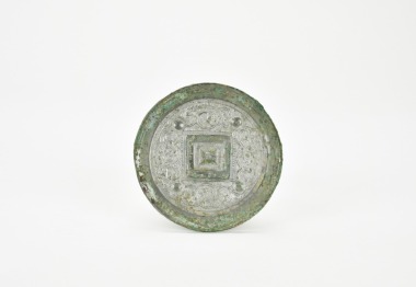 A Bronze Mirror with Auspicious Beast Design, Tang Dynasty (AD 618&ndash;907).
