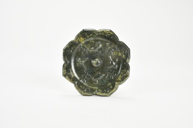 A Chinese Bronze Octafoil Mirror, Tang Dynasty (618&ndash;907).