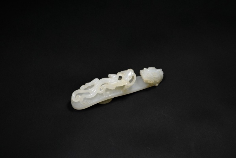 A Superb White Jade Belt Hook with Chilong and Taiji Symbol, Qianlong Period, (Mid-18th Century)
