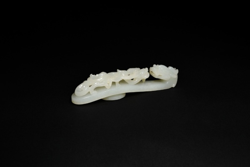 A Fine White Jade Belt Hook with Chilong Design, Qing Dynasty