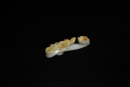 A Finely Carved White Jade Belt Hook with Russet Inclusions and Chilong Design, Qianlong Period (1736&ndash;1795) - 2