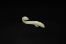 A Fine White and Yellow Jade Belt Hook with Phoenix Head and Ruyi-Cloud Design, Qianlong Period (1736&ndash;1795)