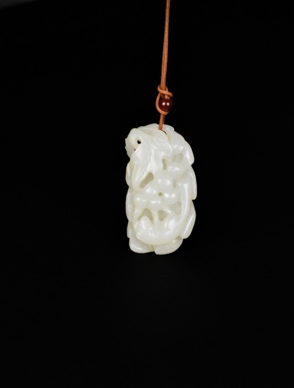 A White Jade Pendant Carved with Squirrel and Grapes, Qing Dynasty (18th&ndash;19th Century)