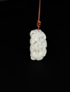 A White Jade Pendant Carved with Squirrel and Grapes, Qing Dynasty (18th&ndash;19th Century)