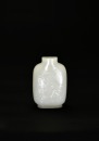 A Yellow-Russet and White Jade Snuff Bottle Carved with &lsquo;Double Magpies and Plum Blossoms&rsquo; &ndash; Joy Up to the Eyebrows, Qing Dynasty (18th&ndash;19th Century)