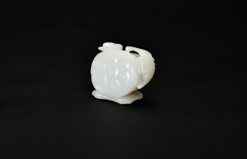 A White Jade Carving of Lotus Flower and PodQing Dynasty (18th&ndash;19th Century)