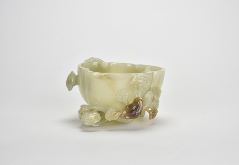 A Celadon-White Jade Washer Carved with Chilong and Lingzhi DesignQing Dynasty, 18th&ndash;19th Century