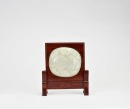 A White Jade Carved &lsquo;Peach of Longevity&rsquo; Plaque on Table Screen, Qing Dynasty