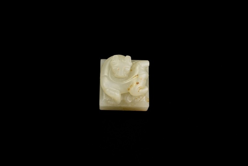 A White Jade Seal with Beast Finial, Han Dynasty (circa 2nd Century BC &ndash; 2nd Century AD)
