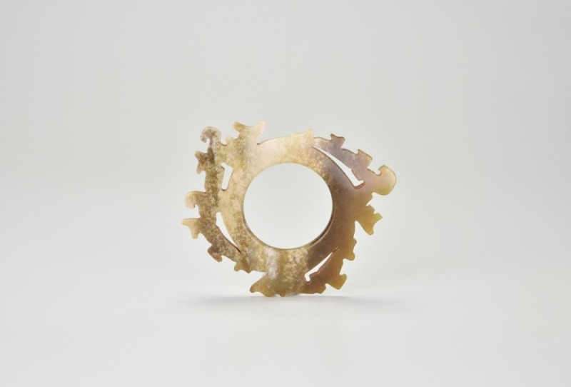 An Archaistic Openwork Jade Disc (Bi) With Dragon Scroll Decoration, Shang To Western Zhou