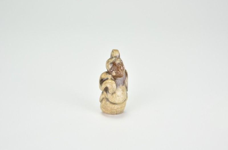 A Carved Celadon And Russet Jade Figure Of An Immortal (Bodhisattva Or Budai), Han Dynasty
