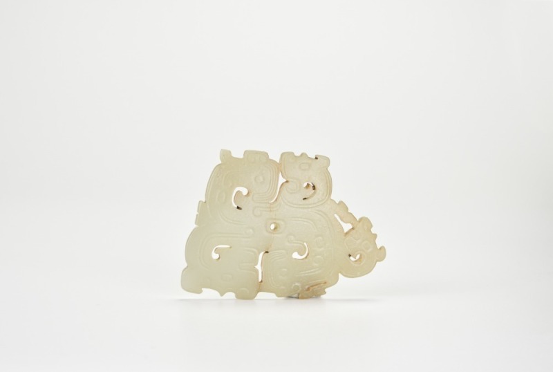 A Celadon Jade Openwork Plaque Carved with Taotie Mask, Shang to Western Zhou Dynasty (circa 13th&ndash;9th Century BC)