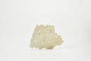 A Celadon Jade Openwork Plaque Carved with Taotie Mask, Shang to Western Zhou Dynasty (circa 13th&ndash;9th Century BC)