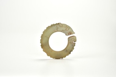 A Rare Celadon Jade Dragon-Head RingWestern Zhou Dynasty (circa 1046-771 Century BC)