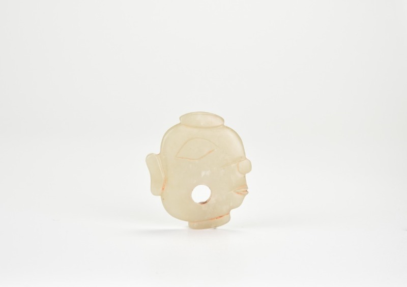 A Rare Jade Human-Head Pendant, Late Neolithic to Early Shang Dynasty