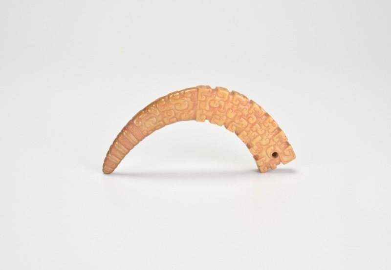 A Carved Yellowish Jade &lsquo;Dragon&rsquo; Pendant (Huang), Han Dynasty (206 Bce &ndash; 220 Ce)