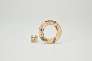 A Carved Jade Ring With Central Spindle Element, Han Dynasty (206 Bce &ndash; 220 Ce)