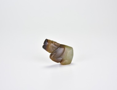 A Rare Archaic Russet-Stained Jade Ox, Western Zhou Dynasty (c. 11th&ndash;8th century BCE)