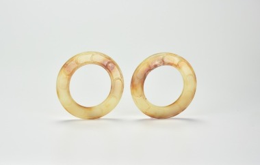 A Pair Of Fine Archaic Hetian Jade Ring (&ldquo; Yuan&rdquo;), Shang Dynasty (c. 13th&ndash;11th century BCE)