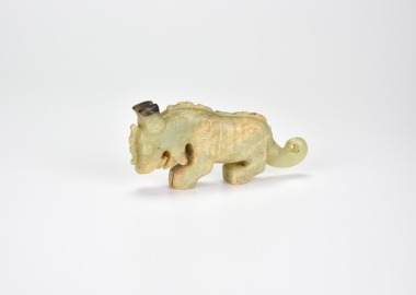 A Rare Archaic Jade &lsquo;Coiled-Tail Tiger&rsquo; Ornament, Western Zhou Dynasty (c. 11th&ndash;8th century BCE)
