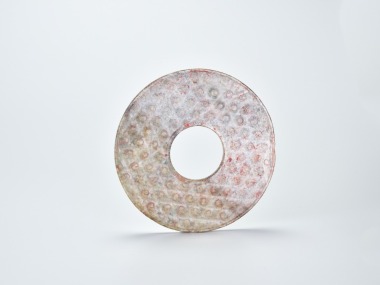 A Rare Han Dynasty Jade Bi Disc with &lsquo;Pu&rsquo; Grain Pattern (c. 2nd century BCE &ndash; 2nd century CE)