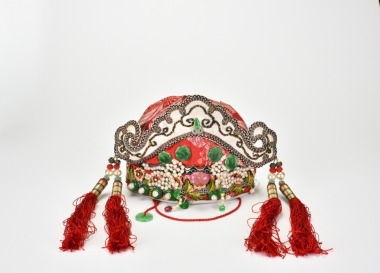 Late Qing Dynasty, A Finely Embroidered Child&rsquo;s Cap with Jade and Pearl Inlay
