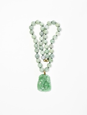 A Fine Jadeite Pendant Necklace &ldquo;Abundance Year After Year&rdquo;, 20th Century.