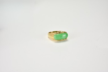 A Jadeite and 14k Gold Ring.