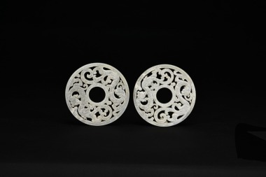 A Pair of Openwork Jade &lsquo;Dragon&rsquo; Bi Discs. Han Dynasty.