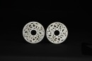A Pair of Openwork Jade &lsquo;Dragon&rsquo; Bi Discs. Han Dynasty.