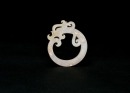 A Celadon Jade &lsquo;Coiled-Tail Dragon&rsquo; Pendant. Han Dynasty (206 BC&ndash;AD 220).