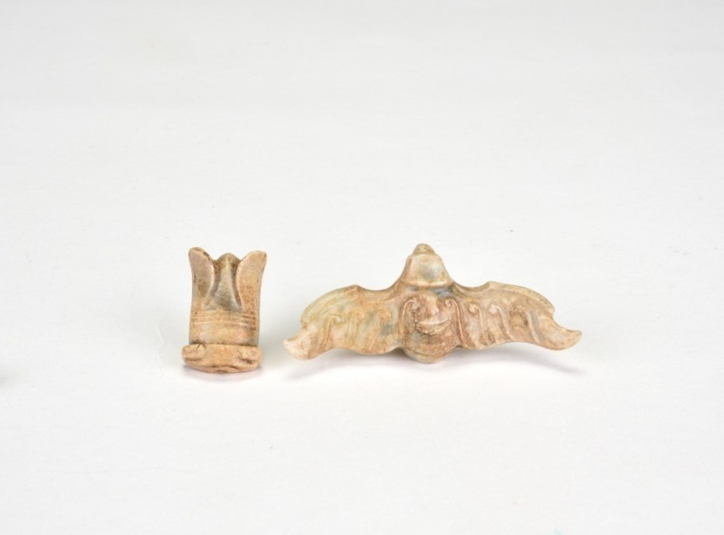 A Group of Two Shijiahe Culture Jade Carvings Eagle and Cicada (1)Jade Eagle-Carved in the round. (2) Jade Cicada-Finely carved as a stylized cicada with folded wings