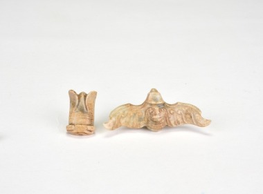 A Group of Two Shijiahe Culture Jade Carvings Eagle and Cicada (1)Jade Eagle-Carved in the round. (2) Jade Cicada-Finely carved as a stylized cicada with folded wings