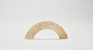 A Rare Multi-Perforated Jade Crescent Pendant with Dragon Motifs (Huang) Early Western Zhou Dynasty, ca. 11th&ndash;9th century BC