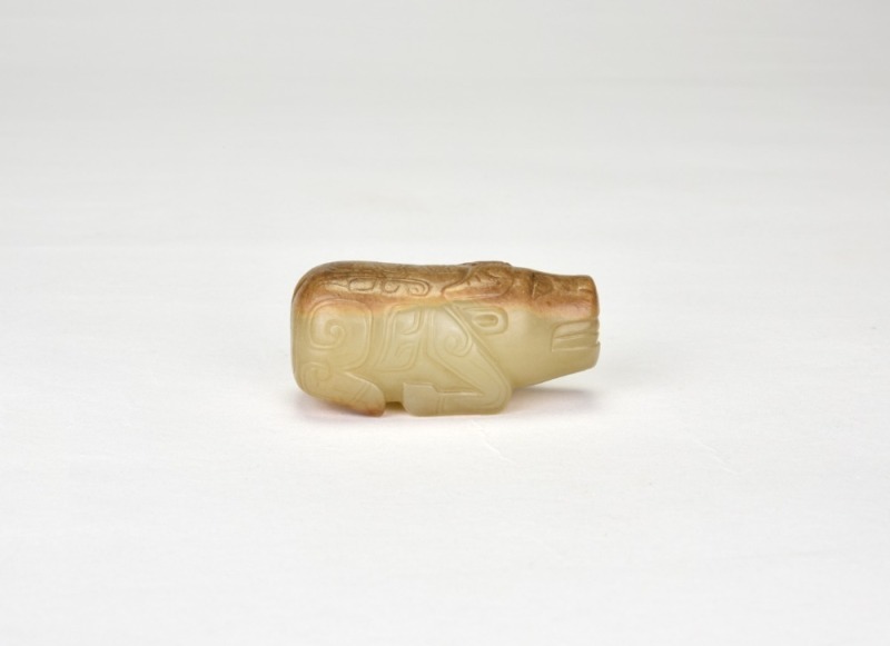 A Jade Figure of a Recumbent Ox, Shang Dynasty.