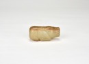 A Jade Figure of a Recumbent Ox, Shang Dynasty.