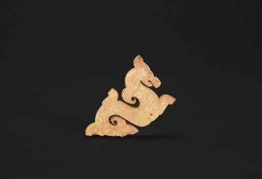 A S-Form Jade Dragon Pendants. Han Dynasty, circa 2nd century BC &ndash; 2nd century AD.