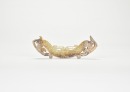 Han Dynasty. Arched Jade Huang with Confronted Double-Dragon Motif.
