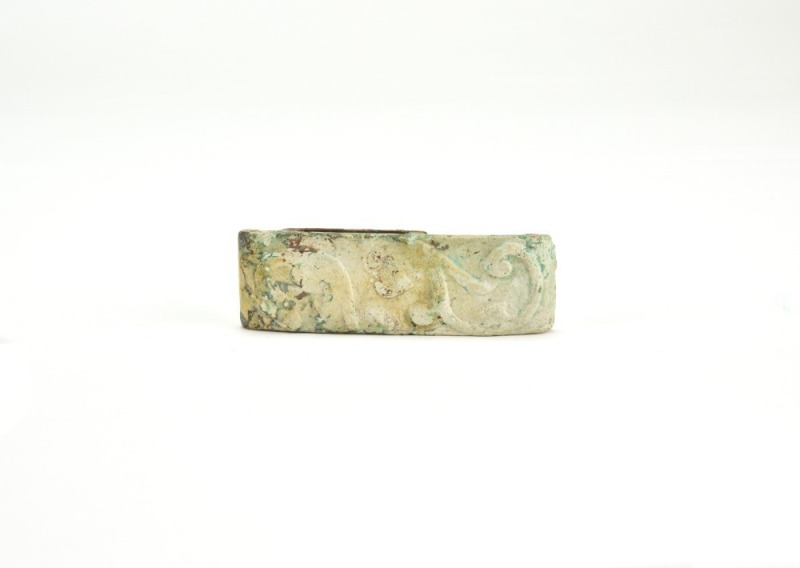 Han Dynasty. Jade Sword Fitting Carved with Confronted Chilong Motifs.