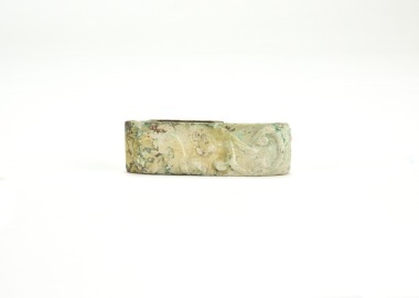 Han Dynasty. Jade Sword Fitting Carved with Confronted Chilong Motifs.
