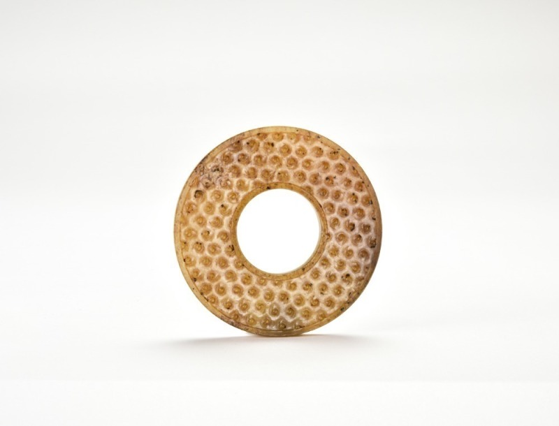 Western Han Dynasty (circa 2nd&ndash;1st century BC) A Carved Jade &lsquo;Gu&rsquo; Pattern Disc (Bi)