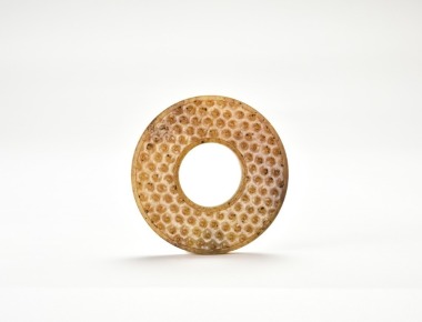 Western Han Dynasty (circa 2nd&ndash;1st century BC) A Carved Jade &lsquo;Gu&rsquo; Pattern Disc (Bi)