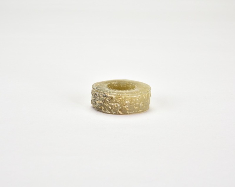 A Carved Jade Ring Neolithic Period, Liangzhu Culture Style.