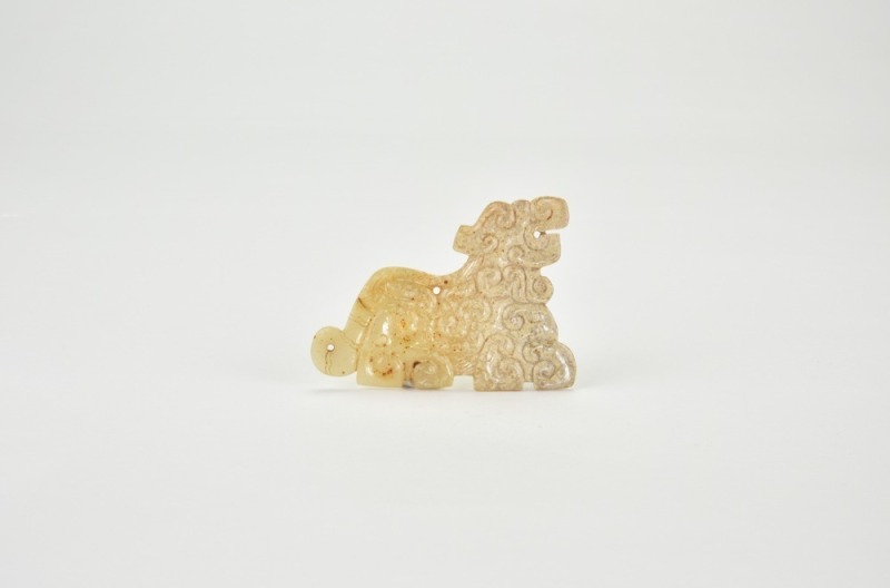 Western Han Dynasty (circa 2nd&ndash;1st century BC) A Carved Jade Mythical Beast Pendant
