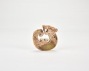Late Warring States to Early Western Han Dynasty (circa 4th&ndash;2nd century BC). A Carved Jade &lsquo;Coiled-Tail Dragon&rsquo; Pendant.